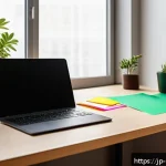브랜드 커뮤니케이션 전문가의 시간 관리 노하우 - A modern Japanese home office setup showcasing a clean and organized desk with a sleek laptop displa...